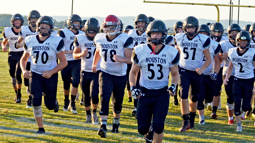 HHS football team coming onto field